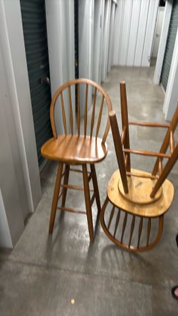 2 wooden bar stools