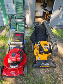 TORO, RECYCLER, 22 INCH LAWN MOWER. AND A CLUB CADET LEAF VAC MAKE ME AN OFFER