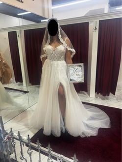 BRAND  NEW  Wedding Dress – Never Worn – Tags Attached – Size M – $599 OBO