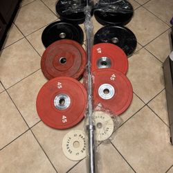 Olympic bumper weights 354lbs total plus brand new 7ft 45lbs bar firm price