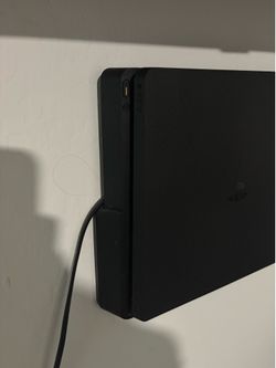 PlayStation 4 with controller
