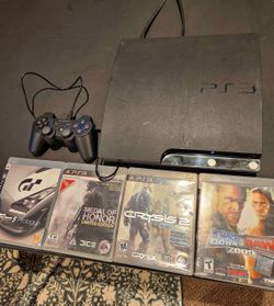 PlayStation 3 with 4 games and  controller