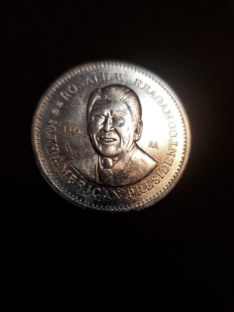 1984 commemorative coin or medal featuring President Ronald Reagan.