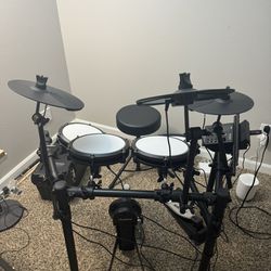 Alesis Electric Drum Set With Sticks, Chair, And Headphone Adapter