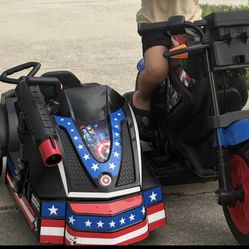 Electric kids motorcycle with sidecar and charger.