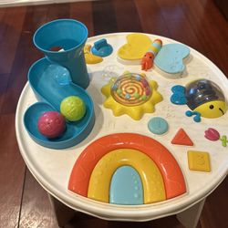 B. play Colorful & Sensory Station Baby Activity Center 