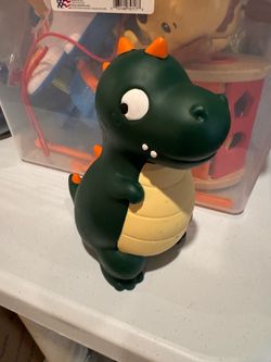 Dinosaur piggy bank