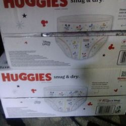 2 Boxes Size 4 Huggies