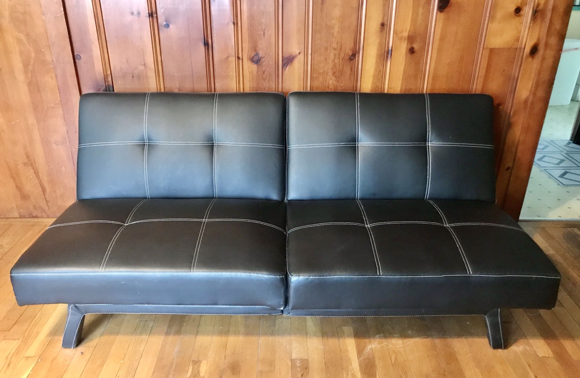 MOVING! MUST GO. Buy One Get One Free Black Faux Leather Futon Sleepers