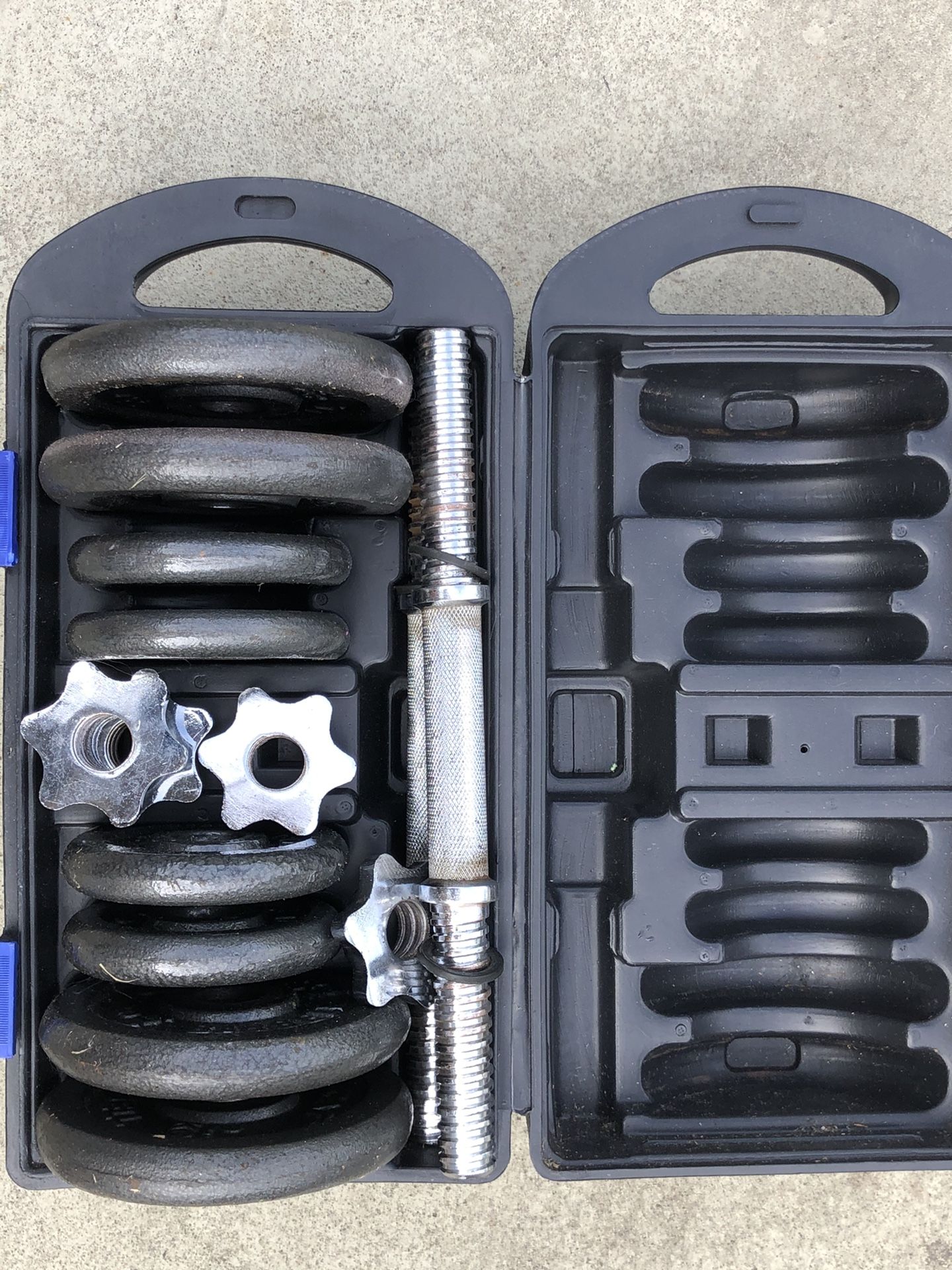 40lbs of standard weights and adjustable dumbbells