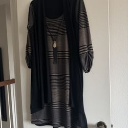 Elegant black piece by Luxology. Versatile and chic. Size L
