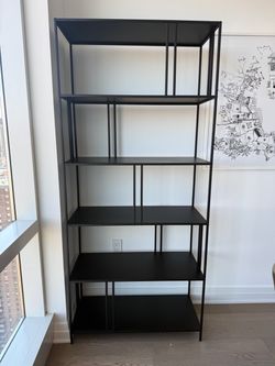 Black metal bookshelf