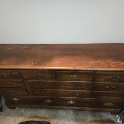Brown dresser and nightstand