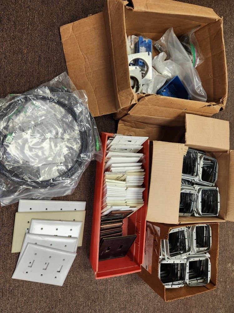 A Bunch Of Residential Electrical Parts ( Cover Plates Box Covers Etc)