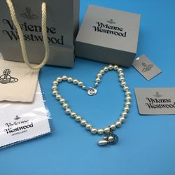 Stylish new Vivienne Westwood silver pearl embossed necklace