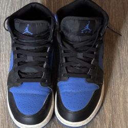 black and royal blue  Jordan 1s