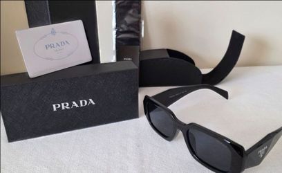 Luxury/Designer BlackSunglasses - Condition is New with paperwork, Case and Box