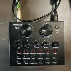 The image shows a V8 Live Sound Card, a portable external sound card designed for live streaming, recording, and karaoke.