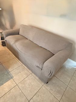 Tan ribbed fabric three seat, Sofa with sleeper