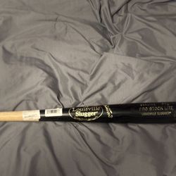 Wooden Louisville slugger bat