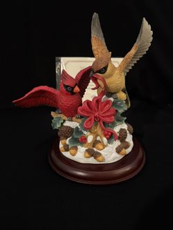 Lenox porcelain "Festive Friends" figurine of two cardinals with winter embellishments.