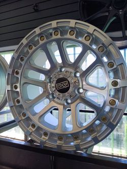 AXD Silver rims 17x9 6x139 On New Tires 265 70 17
