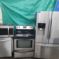 Stainless Steel Set Fridge Stove Dishwasher And Microwave All Good Working Conditions 