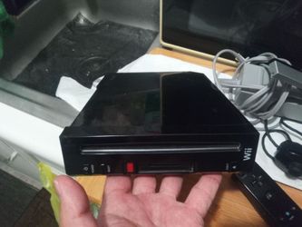 Black Nintendo Wii sport edition  one game $75 takes it firm for all