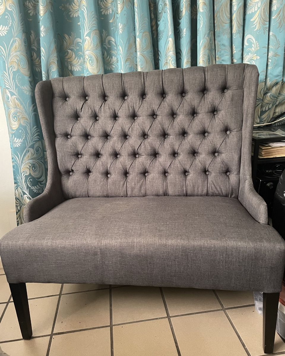 Set Of Living Room Set. Includes a settee, an ottoman, and a chair. Never used. Grey Color and convenience for small spaces 