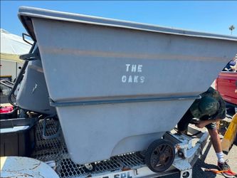Large gray trash cans