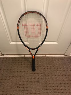Used Wilson tennis racket.