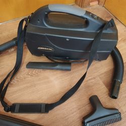 Oreck XL lightweight canister vacuum cleaner kit assembly with wand attachments shoulder strap and extra bags. Pick up in Niles, IL 60714 shipping ava