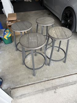 4 Gray Swivel Bar Stools