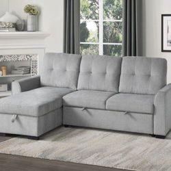 50% SALE Reversible fabric sectional with sleeper and storage