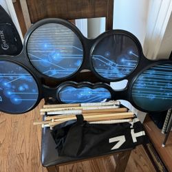 $90 – Xymox Tenor Drum Practice Pad w/ Drumsticks & Bag