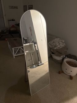 Arched round mirror