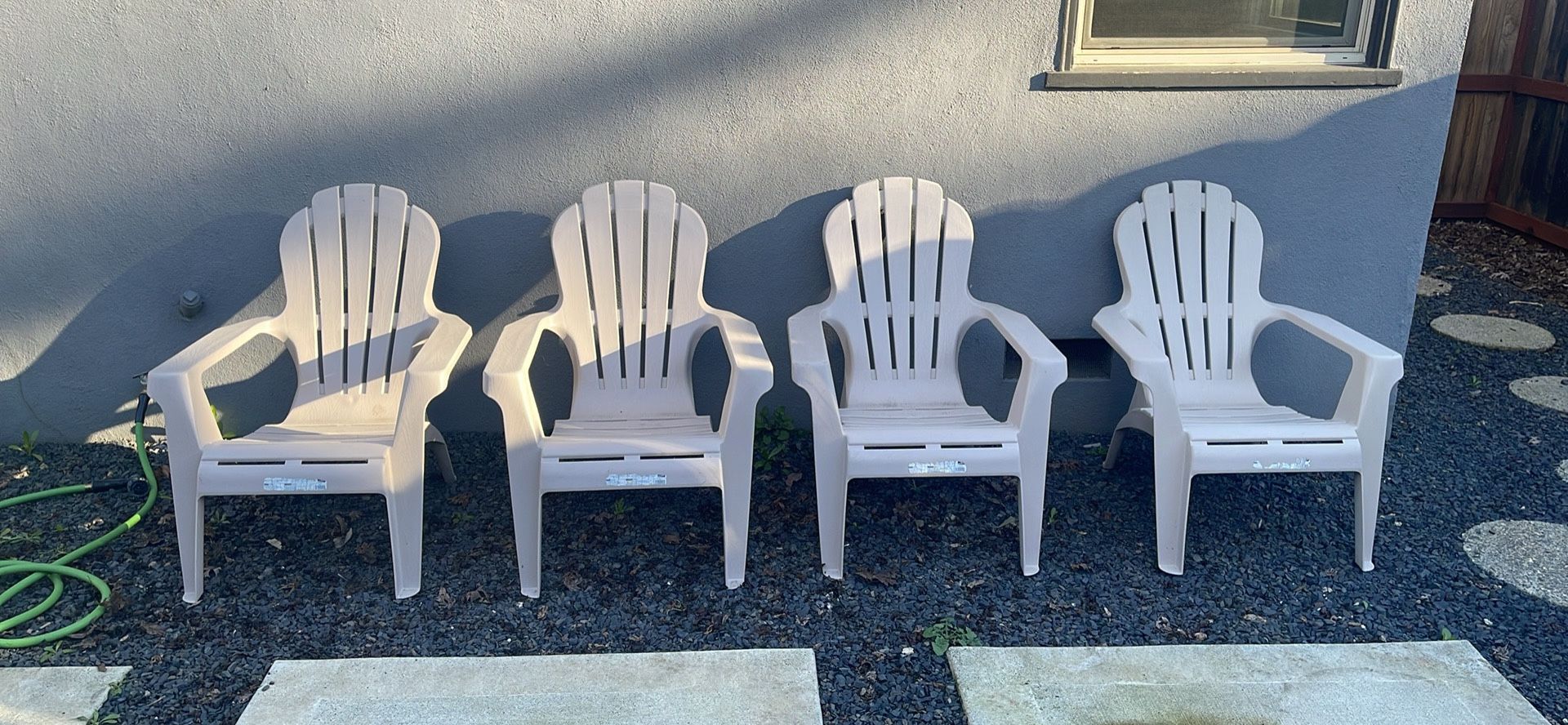 4 Plastic Adirondack Chairs