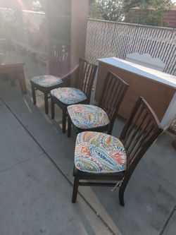 Dark brown wooden chairs