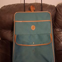 Dark green luggage 🧳