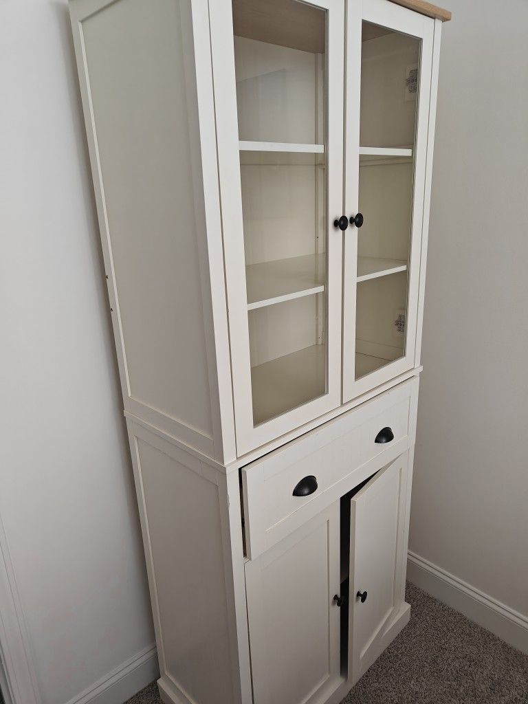 White cabinet with glass doors