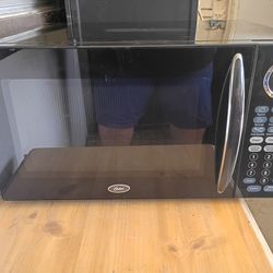 Oster Microwave 1000w, was stored, not used