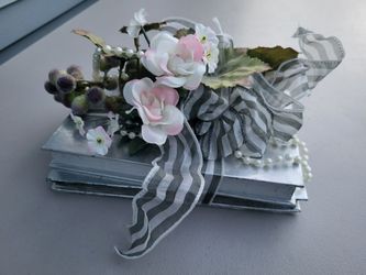 Silver books floral decorative arrangement