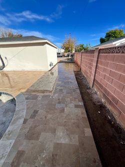 Travertine pavers and turf