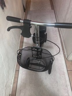 Knee walker with removable basket