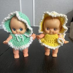 Two Vintage Kewpie Dolls 8" Tall. One in Green and the other in Yellow Yarn Crochet Clothes. Hand Made Clothes. 