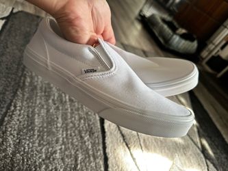 White slip on vans