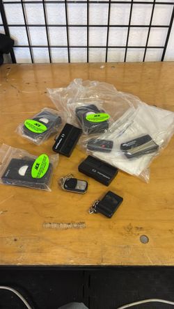 Lot of car fobs and garage openers