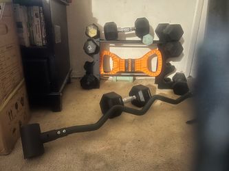 Pairs of 5, 10, 20 and 25lb dumbbells and kettlebell attachment, barbell attachment dumb bell rack . $110 obo
