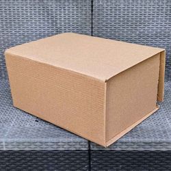 Clean medium size cardboard box for shipping moving or storage