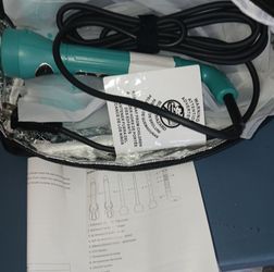 Curling iron with 6 different attachments,  instructions & case